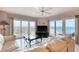Bright living area featuring water views, tile floors, and neutral decor at 2937 S Atlantic Ave # 2001, Daytona Beach, FL 32118