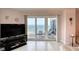 Bright living room boasts a beachfront balcony with stunning ocean views at 2937 S Atlantic Ave # 2001, Daytona Beach, FL 32118