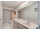 Bathroom with dual sinks and a shower at 3119 Mango Tree Dr, Edgewater, FL 32141
