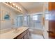 Bathroom featuring a shower and a large vanity at 3119 Mango Tree Dr, Edgewater, FL 32141