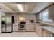 Well-equipped kitchen featuring stainless steel appliances and ample counter space at 3119 Mango Tree Dr, Edgewater, FL 32141
