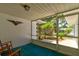 View of screened-in porch offering a comfortable outdoor living space at 3119 Mango Tree Dr, Edgewater, FL 32141