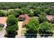 Bird's eye view showcases the property with its long driveway and surrounding landscape at 3513 Kilgallen Ct, Ormond Beach, FL 32174