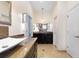 Bathroom with double vanity, stylish vessel sinks, and elegant countertops at 3513 Kilgallen Ct, Ormond Beach, FL 32174
