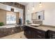 Luxurious bathroom with soaking tub, elegant marble countertops, and fireplace at 3513 Kilgallen Ct, Ormond Beach, FL 32174