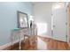 Bedroom with wood floors, desk, and built-in storage at 3513 Kilgallen Ct, Ormond Beach, FL 32174