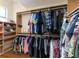 Spacious walk-in closet with custom shelving and ample hanging space for clothes and accessories at 3513 Kilgallen Ct, Ormond Beach, FL 32174