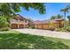 Stately home boasting multiple garages, second story balcony and lush landscaping at 3513 Kilgallen Ct, Ormond Beach, FL 32174