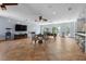 Large game room featuring tile floors, a pool table, game table, bar, and a ceiling fan at 3513 Kilgallen Ct, Ormond Beach, FL 32174
