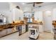 Well-appointed kitchen with granite countertops, white cabinets, and stainless steel appliances at 3513 Kilgallen Ct, Ormond Beach, FL 32174