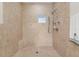 Spacious tiled shower includes built-in seat, showerhead and a hand held sprayer for convenience at 3513 Kilgallen Ct, Ormond Beach, FL 32174