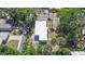 Aerial view of the house showing the roof, palm trees, and surrounding landscaping at 509 Park Dr, Daytona Beach, FL 32114