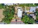 Aerial view of the property showing the house, surrounding trees, and the lot boundary at 509 Park Dr, Daytona Beach, FL 32114