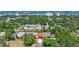 Aerial view of the property and surrounding neighborhood and the coast in the distance at 509 Park Dr, Daytona Beach, FL 32114