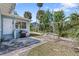 View of backyard and patio with grill at 509 Park Dr, Daytona Beach, FL 32114