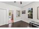 Bedroom with wood floors and trim, and artwork on the wall at 509 Park Dr, Daytona Beach, FL 32114