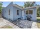 Exterior of home with a grill and outdoor patio area at 509 Park Dr, Daytona Beach, FL 32114
