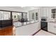 Bright kitchen featuring granite counters with stainless steel appliances and an open layout at 509 Park Dr, Daytona Beach, FL 32114