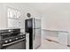 Bright, modern kitchen with white cabinetry and stainless steel appliances at 509 Park Dr, Daytona Beach, FL 32114