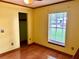 Bedroom featuring hardwood floors and a window for lots of natural light at 601 E Tall Pine Ter, Deland, FL 32724