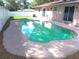 Private backyard pool with ample concrete patio space for outdoor lounging at 601 E Tall Pine Ter, Deland, FL 32724