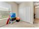 Well-lit bedroom with a closet and a large window, offering ample storage and natural light at 69 Coquina Ridge Way, Ormond Beach, FL 32174