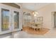 Elegant dining room featuring stylish furniture and natural light at 69 Coquina Ridge Way, Ormond Beach, FL 32174