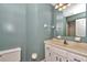 Bathroom featuring a single sink vanity, with a shower-tub combo at 8720 Sw 108Th Ln, Ocala, FL 34481