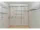 Walk in closet with several rows of metal shelving at 8720 Sw 108Th Ln, Ocala, FL 34481