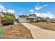 Cozy one-story home featuring an attached garage and tidy front yard at 8720 Sw 108Th Ln, Ocala, FL 34481