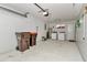 Spacious two car garage with laundry hookups, offering ample storage and parking space at 8720 Sw 108Th Ln, Ocala, FL 34481