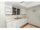 Bright kitchen with a window above the sink and ample countertop space at 8720 Sw 108Th Ln, Ocala, FL 34481