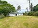 Rear exterior view of the home at 1355 Dexter E Dr, Port Orange, FL 32129