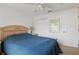 Well-lit bedroom featuring a ceiling fan, neutral walls, and a closet at 1956 Southern Dunes Blvd, Haines City, FL 33844