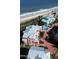 Aerial view shows houses and the beautiful ocean at 3000 Ocean Shore Blvd # 150, Ormond Beach, FL 32176