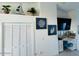 View of bedroom featuring upper-level closet and television at 3000 Ocean Shore Blvd # 150, Ormond Beach, FL 32176