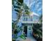 Charming multi-story house with lush greenery, multiple balconies and inviting entry at 3000 Ocean Shore Blvd # 150, Ormond Beach, FL 32176