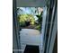 Outdoor deck area featuring lush greenery and serene views at 3000 Ocean Shore Blvd # 150, Ormond Beach, FL 32176