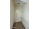 Organized walk-in closet with shelving, offering ample storage at 3000 Ocean Shore Blvd # 150, Ormond Beach, FL 32176
