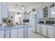 Well-lit kitchen boasting ample cabinet space, modern appliances, and a clean, functional design at 4622 Secret River Trl, Port Orange, FL 32129
