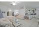 Spacious living area flowing into dining room and kitchen, perfect for modern living at 4622 Secret River Trl, Port Orange, FL 32129