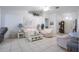 Bright living room with tile floors, neutral walls, and comfortable seating; perfect for relaxation at 4622 Secret River Trl, Port Orange, FL 32129