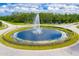 The community features an aerial view of a water fountain in the middle of a roundabout at 5 Cantilever Ct, Ormond Beach, FL 32174