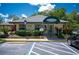 The Hunter's Ridge clubhouse features well-manicured landscaping and convenient parking at 5 Cantilever Ct, Ormond Beach, FL 32174