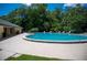 Enjoy the community pool with plenty of lounge seating and sunny views of the landscape at 5 Cantilever Ct, Ormond Beach, FL 32174