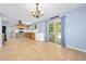 Open-concept kitchen and dining area features modern appliances and ample natural light at 5 Cantilever Ct, Ormond Beach, FL 32174
