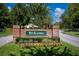 This community offers lush landscaping at the welcome sign at 5 Cantilever Ct, Ormond Beach, FL 32174