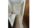 Simple bathroom featuring a single-sink vanity and a shower-tub combo at 9393 Sw 102Nd Pl, Ocala, FL 34481