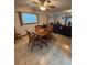 Casual dining area with wood table set and natural lighting at 9393 Sw 102Nd Pl, Ocala, FL 34481