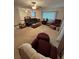 Spacious living room with neutral carpet and furniture set and ceiling fan at 9393 Sw 102Nd Pl, Ocala, FL 34481